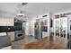 Kitchen with stainless steel appliances and wood-look flooring at 1820 N 7Th Ave, Phoenix, AZ 85007