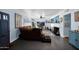 Bright living room boasts comfortable seating, a large TV, and blue accent walls, creating an inviting and stylish space at 1820 N 7Th Ave, Phoenix, AZ 85007