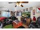 Charming living room with a ceiling fan, comfortable seating, and a fireplace at 1820 N 7Th Ave, Phoenix, AZ 85007