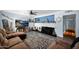 Living room featuring a fireplace and a mounted television at 1820 N 7Th Ave, Phoenix, AZ 85007