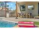 Backyard oasis with pool, outdoor dining and kitchen making it an entertainer's dream at 3125 N 86Th Pl, Scottsdale, AZ 85251