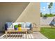 Cozy outdoor seating area with plush cushions, perfect for relaxation and enjoying the backyard at 3125 N 86Th Pl, Scottsdale, AZ 85251