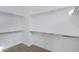 Walk-in closet features wood-look tile flooring and metal racks at 3624 N 59Th St, Mesa, AZ 85215