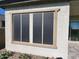 Exterior view showing installed sunscreens on a charming home, enhancing privacy and reducing heat at 3624 N 59Th St, Mesa, AZ 85215
