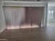 Bright living room featuring light tile floors and modern white vertical blinds on a large window at 3624 N 59Th St, Mesa, AZ 85215