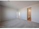 Spacious carpeted bedroom with an en-suite bathroom at 40000 W Bravo Dr, Maricopa, AZ 85138