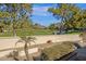 Step down patio, partial mountain views, lush landscaping, and golf course view at 2626 E Arizona Biltmore Cir # 40, Phoenix, AZ 85016