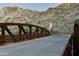 Picturesque bridge set against a scenic mountain backdrop, perfect for a hike at 2626 E Arizona Biltmore Cir # 40, Phoenix, AZ 85016