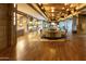 Elegant lobby featuring stylish seating, warm lighting, and beautiful hardwood flooring at 2626 E Arizona Biltmore Cir # 40, Phoenix, AZ 85016