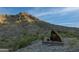 View of Phoenix Mountain Preserve featuring a sign amidst desert landscape and mountains at 2626 E Arizona Biltmore Cir # 40, Phoenix, AZ 85016