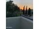 Scenic view of sunset over manicured landscaping and architecture at 2626 E Arizona Biltmore Cir # 40, Phoenix, AZ 85016