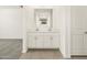 Double vanity bathroom with quartz countertops and modern faucets at 4033 S 177Th Ave, Goodyear, AZ 85338