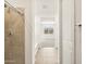 Bathroom features shower, built-in bench, and tiled flooring at 4033 S 177Th Ave, Goodyear, AZ 85338