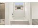 Bathroom with soaking tub and shower at 4033 S 177Th Ave, Goodyear, AZ 85338