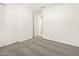 Bright bedroom with plush carpeting and double door closet at 4033 S 177Th Ave, Goodyear, AZ 85338