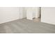 Spacious bedroom with grey carpet and neutral walls at 4033 S 177Th Ave, Goodyear, AZ 85338