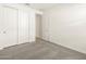Simple bedroom with carpet and mirrored closet doors at 4033 S 177Th Ave, Goodyear, AZ 85338