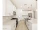 Modern kitchen with white cabinets and stainless steel appliances at 4033 S 177Th Ave, Goodyear, AZ 85338