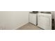 Laundry room with Whirlpool washer and dryer at 4033 S 177Th Ave, Goodyear, AZ 85338
