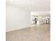 Spacious living room with tile floors and access to the kitchen at 4033 S 177Th Ave, Goodyear, AZ 85338