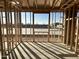 Interior framing of a new home with a view of the backyard at 5625 W Mcneil St, Laveen, AZ 85339