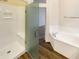 Bathroom with shower, bathtub and updated flooring at 15732 E Yucca Dr, Fountain Hills, AZ 85268