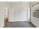 Bright bedroom with double door closet and carpet flooring at 15732 E Yucca Dr, Fountain Hills, AZ 85268