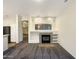 Bright living room with a fireplace and built-in shelving at 15732 E Yucca Dr, Fountain Hills, AZ 85268