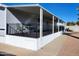 Covered patio with metal railing and small table and chairs at 394 N Pinyon Dr, Apache Junction, AZ 85120