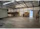 Well-lit garage with workbench and additional storage options at 394 N Pinyon Dr, Apache Junction, AZ 85120