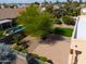 Aerial view of landscaped backyard, manicured lawn, and inviting swimming pool at 923 W Crooked Stick Dr, Casa Grande, AZ 85122
