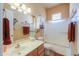 Full bathroom with neutral countertops, vanity, and tub with shower at 923 W Crooked Stick Dr, Casa Grande, AZ 85122