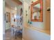 Hallway with archway entrance, neutral walls, and stylish décor at 923 W Crooked Stick Dr, Casa Grande, AZ 85122