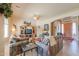 Spacious living room with comfortable seating, ceiling fan, and ample natural light at 923 W Crooked Stick Dr, Casa Grande, AZ 85122