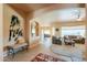 Inviting living room featuring archways, neutral tones, plush seating and decorative accents at 923 W Crooked Stick Dr, Casa Grande, AZ 85122