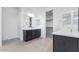 Bathroom featuring dual vanity sinks, tile flooring, and ample storage space at 3804 S Buttercup --, Mesa, AZ 85212