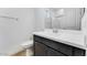 Bathroom features a single sink vanity with dark brown cabinets and tile floors at 3804 S Buttercup --, Mesa, AZ 85212