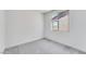 Bedroom with neutral carpet and a window showing neighborhood views at 3804 S Buttercup --, Mesa, AZ 85212