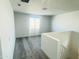 Second floor room with neutral carpet, white walls and a window with lots of natural light at 3804 S Buttercup --, Mesa, AZ 85212