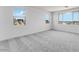 Bright bedroom boasts plush carpeting and sun-drenched windows with marina view at 3804 S Buttercup --, Mesa, AZ 85212