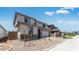 Two-story home with a two-car garage, stone accents, and desert landscaping at 3804 S Buttercup --, Mesa, AZ 85212
