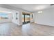 Bright living room with a sliding glass door leading to an outdoor patio or backyard area at 3804 S Buttercup --, Mesa, AZ 85212