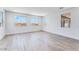 Bright and open living room with multiple windows offering plenty of natural light at 3804 S Buttercup --, Mesa, AZ 85212