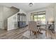Cozy dining area with seating for four and sliding glass doors to a covered outdoor space at 4446 W Hower Rd, Phoenix, AZ 85086