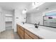 Modern bathroom with dual vanity, stylish fixtures, and lots of light at 25238 N 172Nd Ln, Surprise, AZ 85378