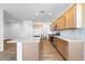 Bright kitchen features a spacious island, ample counter space, and modern appliances at 25238 N 172Nd Ln, Surprise, AZ 85378
