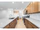Bright kitchen features a spacious island, ample counter space, and stainless appliances at 25238 N 172Nd Ln, Surprise, AZ 85378