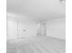 Expansive living room with plush carpeting and lots of natural light at 25238 N 172Nd Ln, Surprise, AZ 85378
