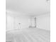 Expansive living room with plush carpeting and lots of natural light at 25238 N 172Nd Ln, Surprise, AZ 85378