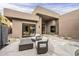 Inviting back patio with stylish outdoor seating and desert landscaping, perfect for relaxing and enjoying the outdoor space at 37200 N Cave Creek Rd # 1023, Scottsdale, AZ 85262